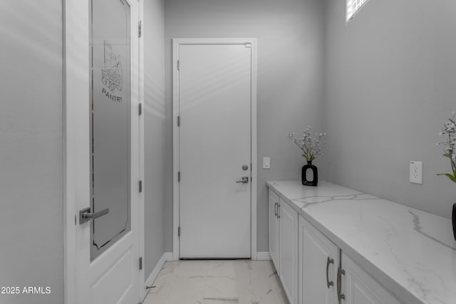 22837 E Silver Creek Ln, Queen Creek, AZ 85142 - bathroom featuring marble finish floor and baseboards