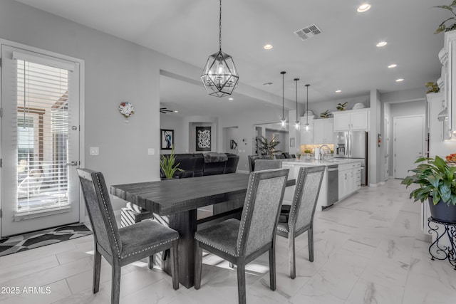 22837 E Silver Creek Ln, Queen Creek, AZ 85142 - dining space featuring a chandelier, visible vents, and recessed lighting