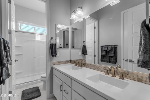 22837 E Silver Creek Ln, Queen Creek, AZ 85142 - bathroom with a stall shower, a sink, toilet, and double vanity