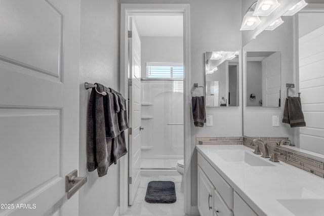 22837 E Silver Creek Ln, Queen Creek, AZ 85142 - full bathroom with double vanity, a stall shower, toilet, marble finish floor, and a sink