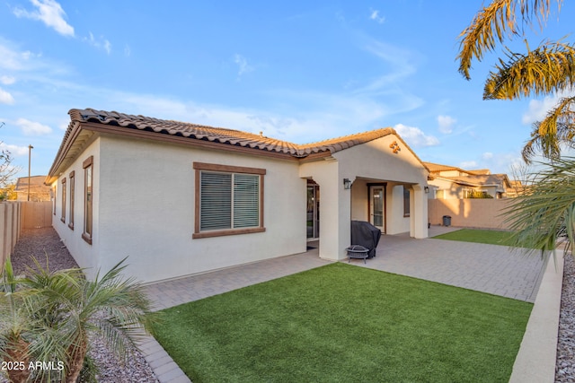 22837 E Silver Creek Ln, Queen Creek, AZ 85142 - back of house with a patio, a fenced backyard, a tiled roof, and stucco siding