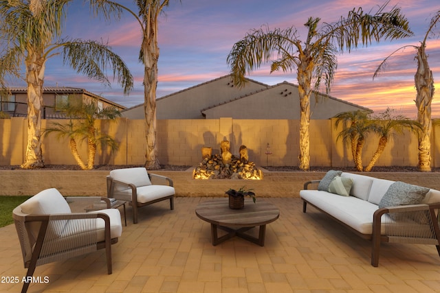 22837 E Silver Creek Ln, Queen Creek, AZ 85142 - patio terrace at dusk featuring a fenced backyard