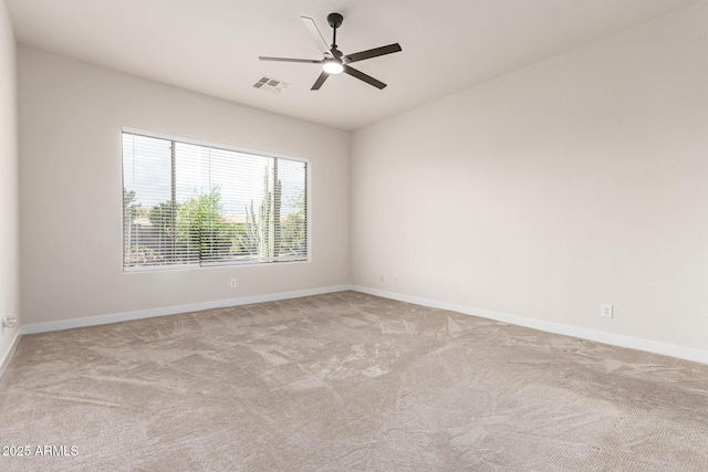 1112 E Winged Foot Dr, Chandler, AZ 85249 - carpeted spare room with baseboards, visible vents, and a ceiling fan