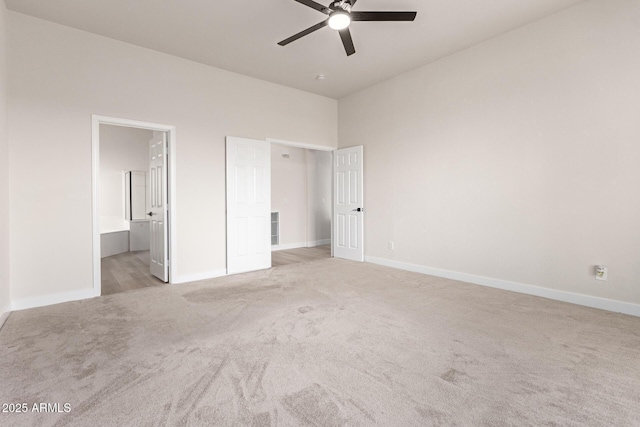 1112 E Winged Foot Dr, Chandler, AZ 85249 - unfurnished bedroom with connected bathroom, baseboards, carpet floors, and a ceiling fan
