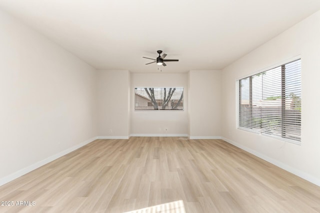 1112 E Winged Foot Dr, Chandler, AZ 85249 - empty room with baseboards, light wood finished floors, and ceiling fan