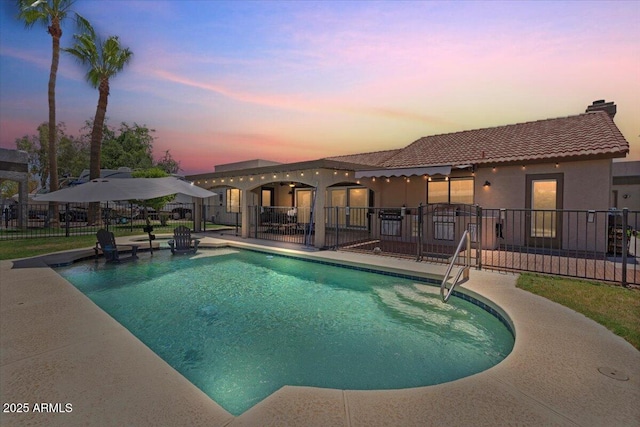 1670 E Whitten St, Chandler, AZ 85225 - pool at dusk featuring a patio