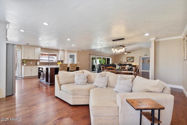 1670 E Whitten St, Chandler, AZ 85225 - living area featuring recessed lighting, wood finished floors, ornamental molding, baseboards, and a chandelier