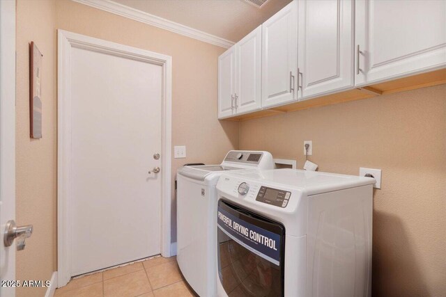 1670 E Whitten St, Chandler, AZ 85225 - washroom with cabinet space, washing machine and clothes dryer, crown molding, light tile patterned floors, and baseboards