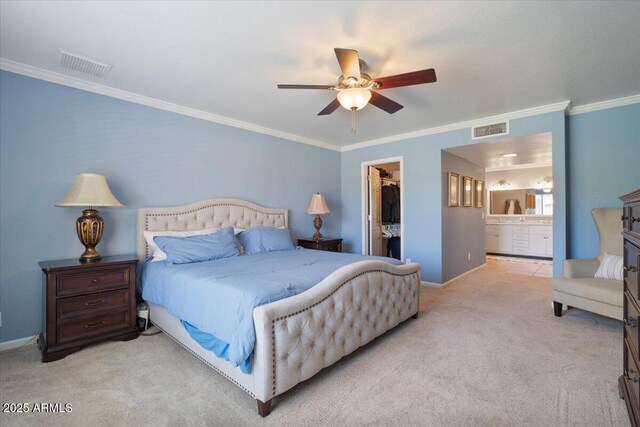 1670 E Whitten St, Chandler, AZ 85225 - carpeted bedroom featuring a spacious closet, ornamental molding, a closet, baseboards, and ensuite bath