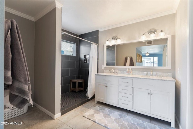 1670 E Whitten St, Chandler, AZ 85225 - bathroom featuring tiled shower, double vanity, tile patterned floors, and crown molding
