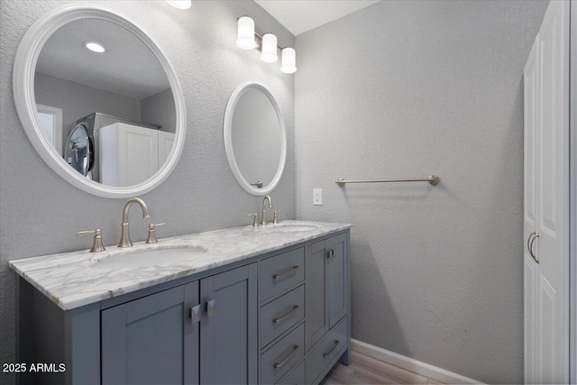 1670 E Whitten St, Chandler, AZ 85225 - full bath featuring double vanity, baseboards, and wood finished floors