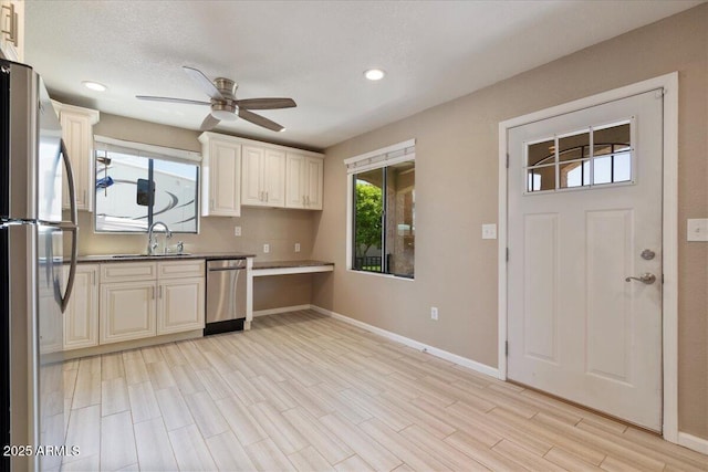 1670 E Whitten St, Chandler, AZ 85225 - kitchen with stainless steel appliances, a sink, ceiling fan, baseboards, and recessed lighting