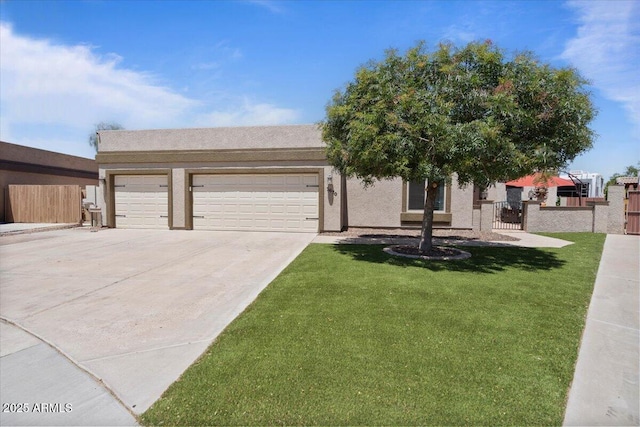 1670 E Whitten St, Chandler, AZ 85225 - view of front of home with an attached garage, concrete driveway, and stucco siding