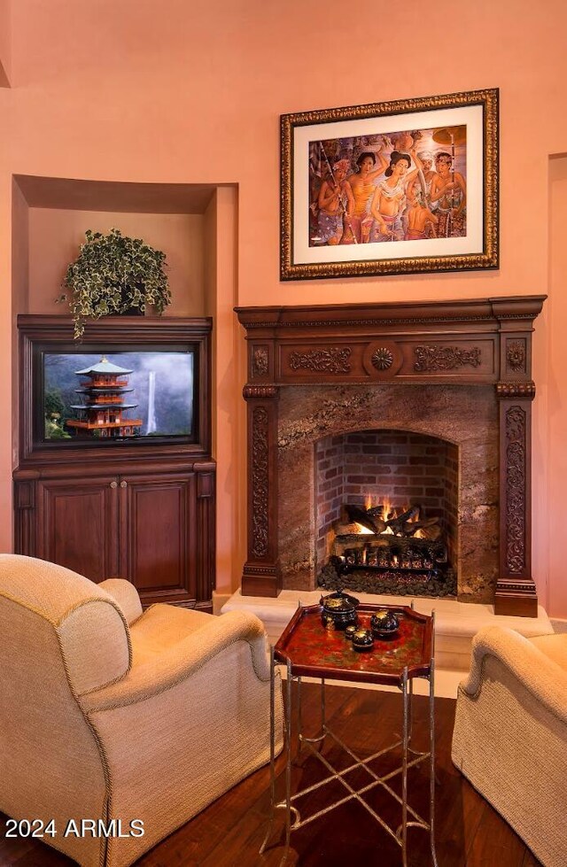 sitting room with hardwood / wood-style floors