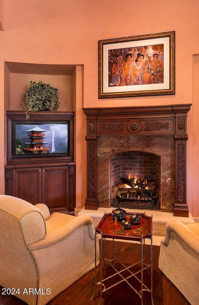 9808 E Honey Mesquite Dr, Scottsdale, AZ 85262 - living room featuring a high end fireplace and wood finished floors