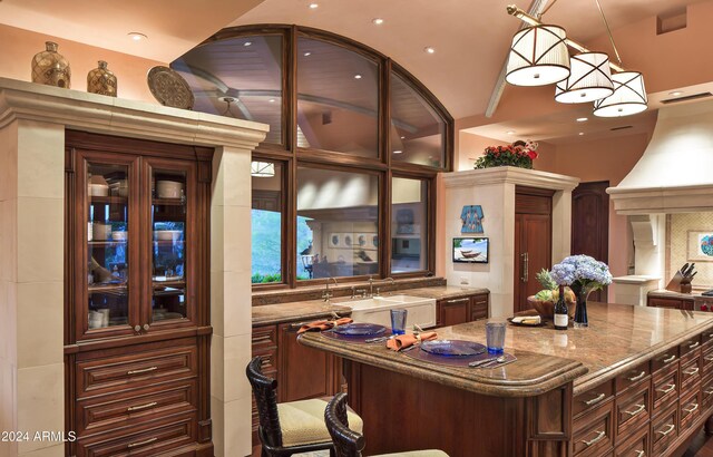 9808 E Honey Mesquite Dr, Scottsdale, AZ 85262 - bar area with a sink, decorative light fixtures, decorative backsplash, recessed lighting, and custom exhaust hood