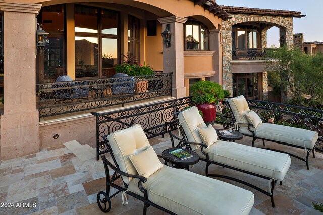 view of patio / terrace with a balcony