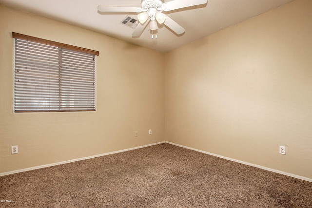 empty room with carpet floors and ceiling fan