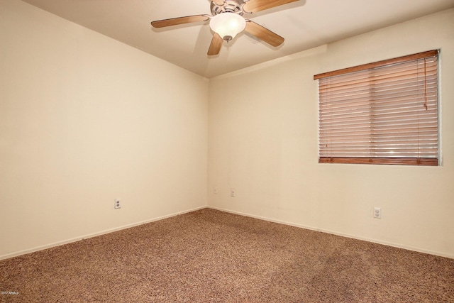 carpeted empty room with ceiling fan