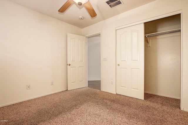 unfurnished bedroom with carpet flooring, a closet, and ceiling fan