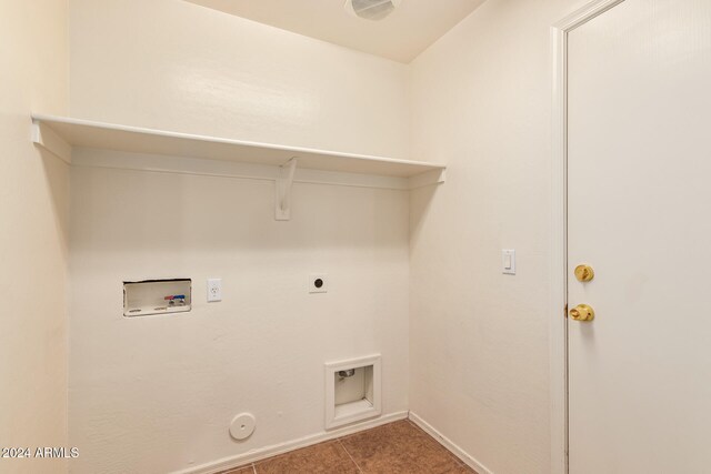 laundry room with gas dryer hookup, tile patterned flooring, washer hookup, and hookup for an electric dryer