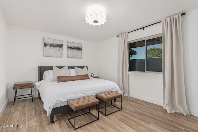 bedroom featuring light hardwood / wood-style floors