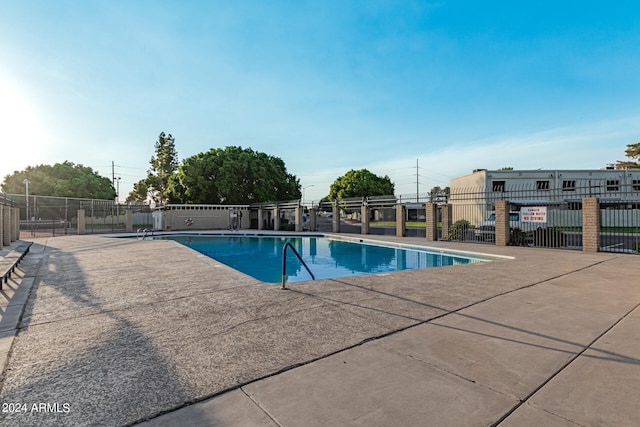 view of pool featuring a patio