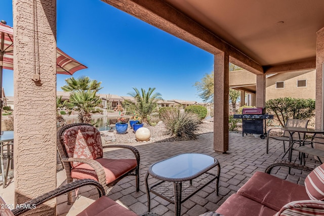 view of patio featuring grilling area and outdoor dining space
