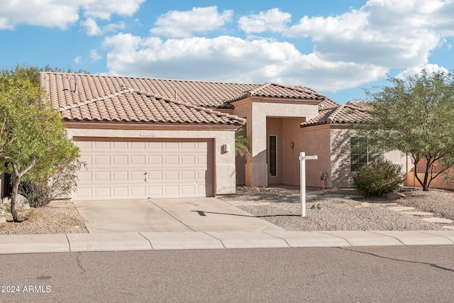 view of front of property with a garage