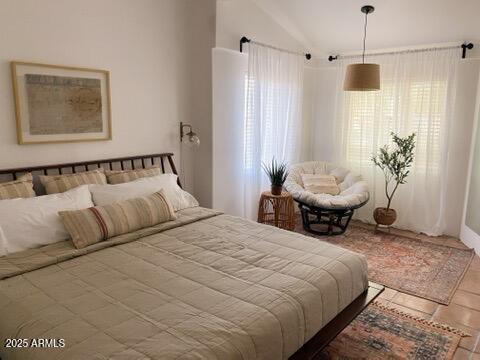 106 W Washington Ave, Gilbert, AZ 85233 - bedroom with multiple windows, vaulted ceiling, and tile patterned floors