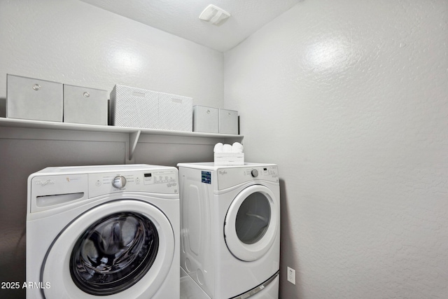 laundry area featuring washer and clothes dryer