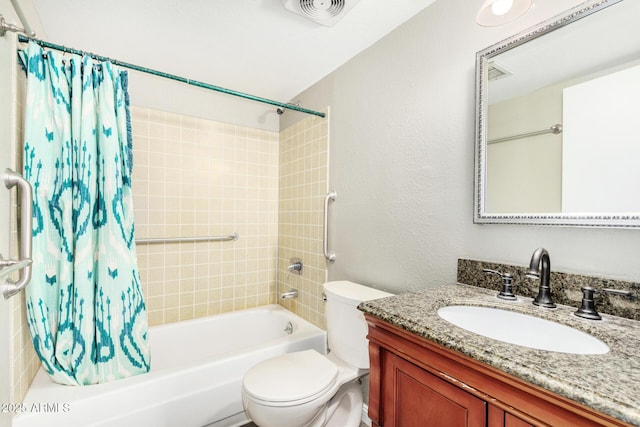 full bathroom featuring vanity, shower / bath combination with curtain, and toilet