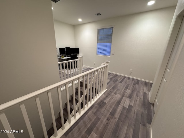 hallway featuring dark hardwood / wood-style floors