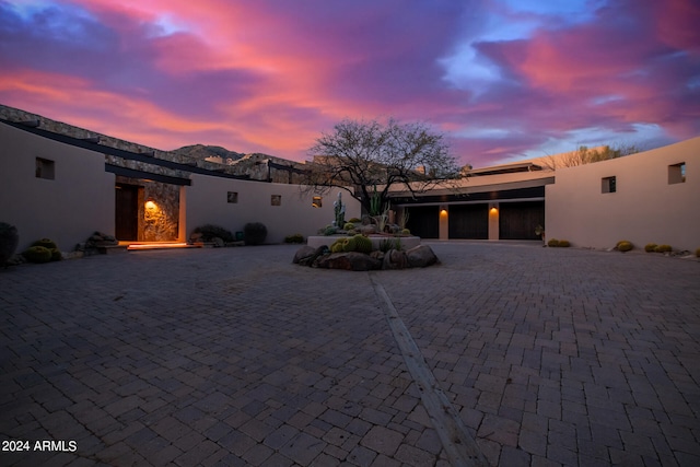 southwest-style home featuring a patio area