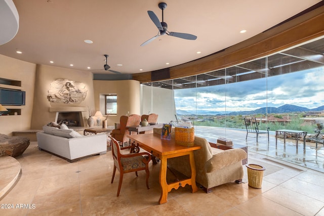 interior space featuring a mountain view and ceiling fan