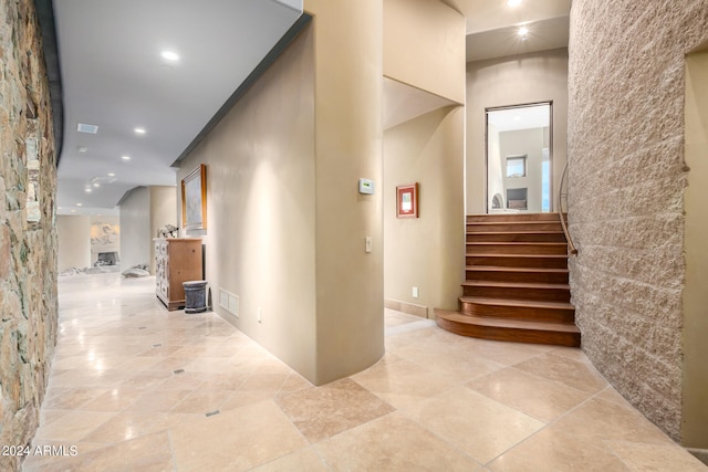 corridor with light tile flooring