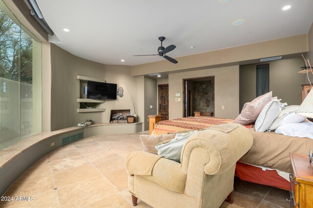 bedroom featuring ceiling fan, light tile floors, and access to exterior