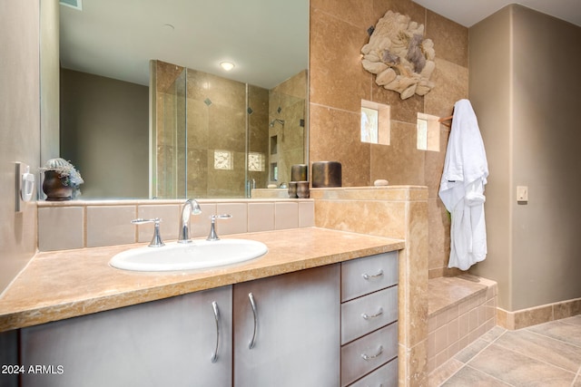 bathroom with tile flooring, tile walls, backsplash, vanity, and plus walk in shower