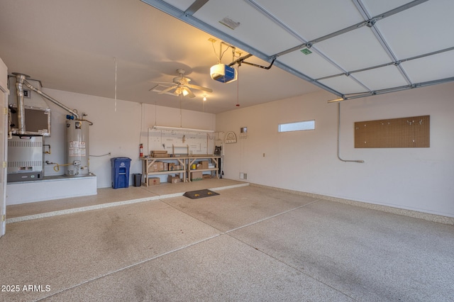 garage with heating unit, a garage door opener, and water heater