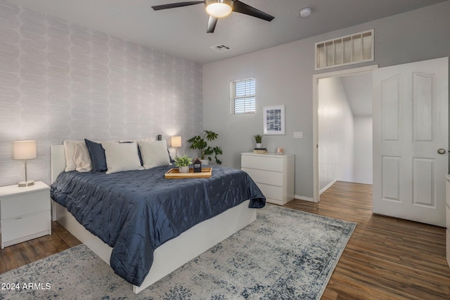 bedroom featuring ceiling fan and hardwood / wood-style flooring