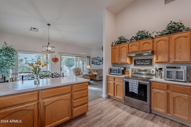 kitchen featuring pendant lighting, lofted ceiling, an inviting chandelier, light hardwood / wood-style floors, and stainless steel appliances