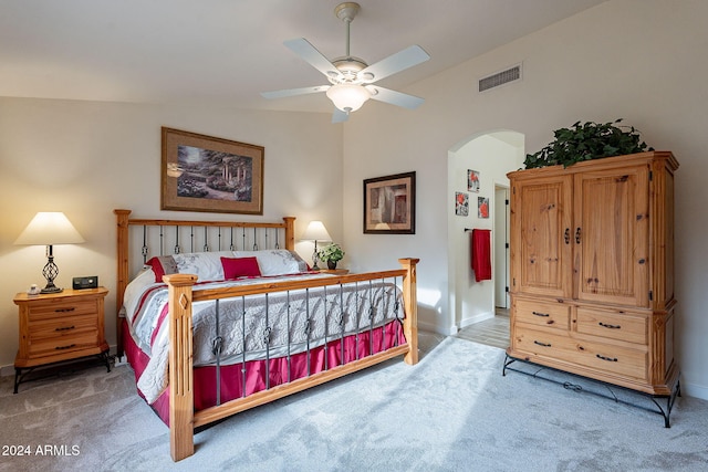 bedroom with carpet flooring, ceiling fan, and lofted ceiling