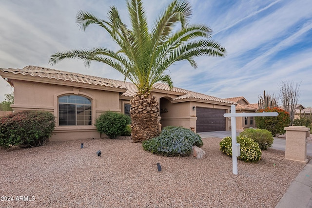 view of front of property with a garage