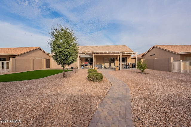 view of front of home with a patio area