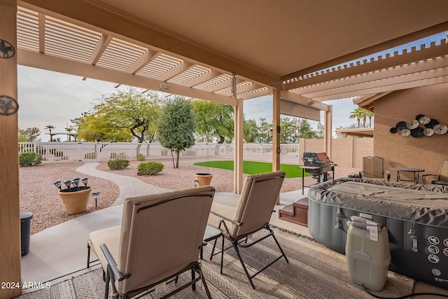 view of patio with a pergola, a hot tub, and grilling area