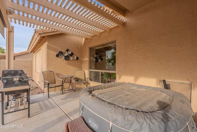 view of patio / terrace featuring a pergola and grilling area