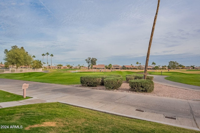 view of community featuring a lawn