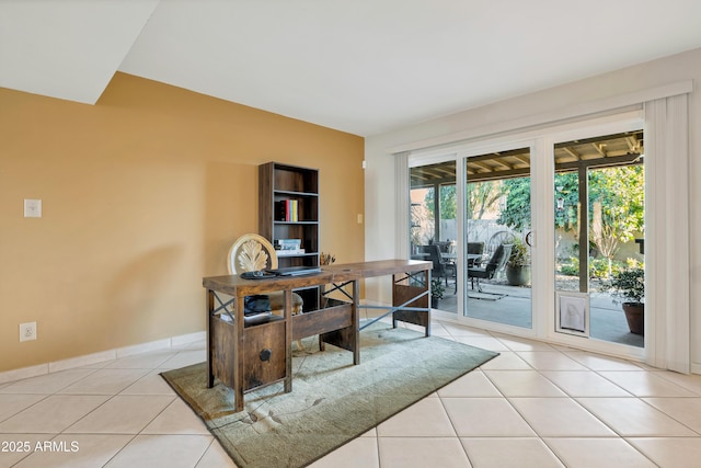 office space with light tile patterned floors