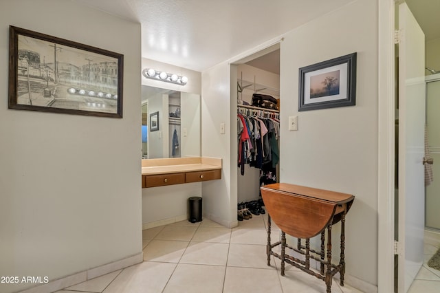 bathroom with tile patterned floors