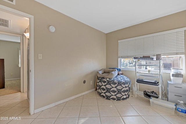 living area featuring light tile patterned floors